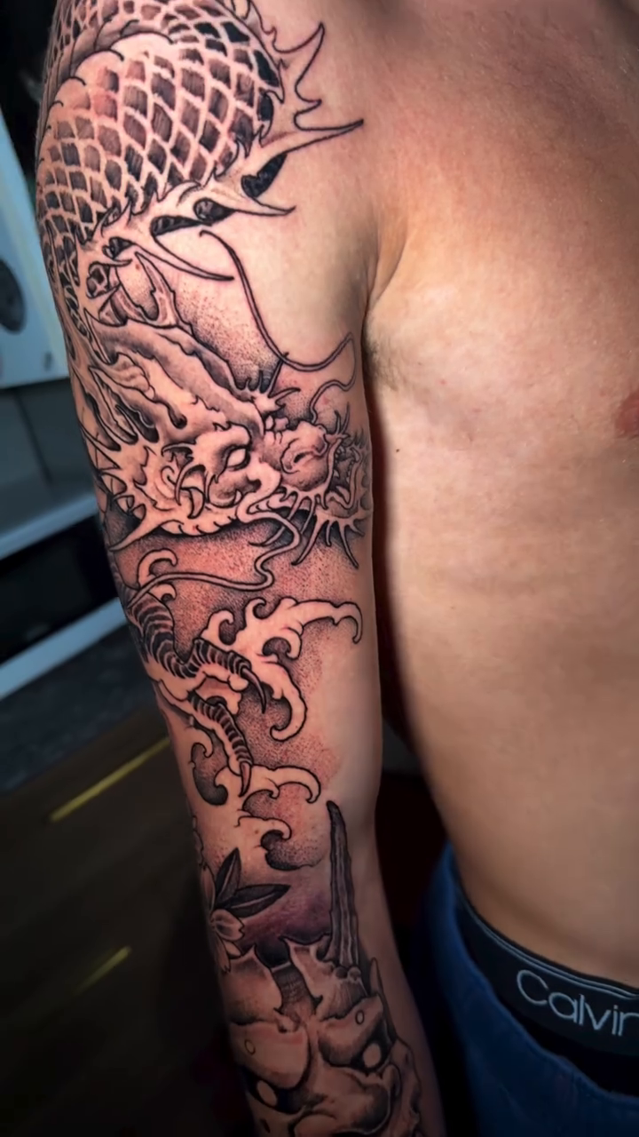 Tattoo by @inkedby_adam — japanese_irezumi, black_and_grey