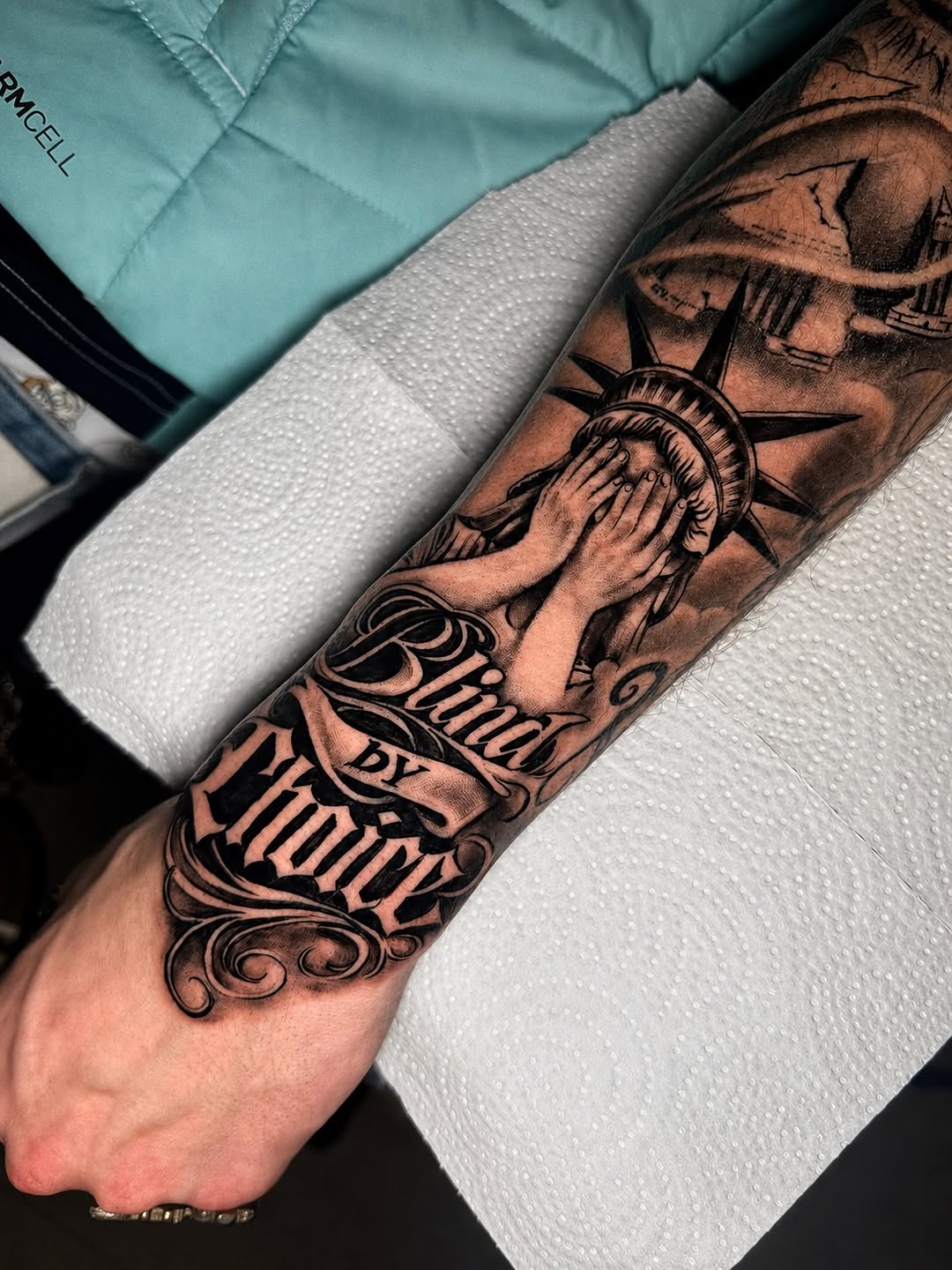 Tattoo by @recky.tattoos — black_and_grey, lettering_script