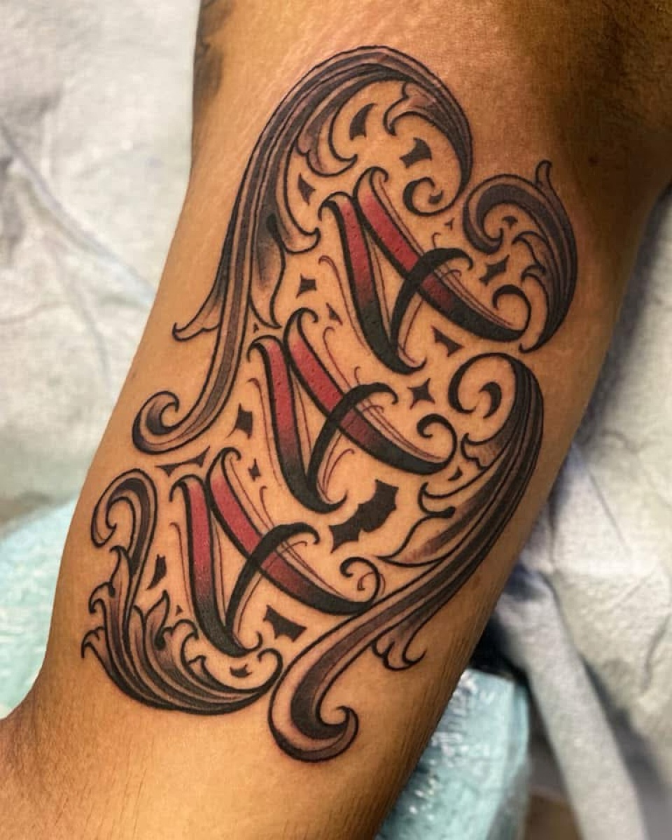 Tattoo by @lexmiranda — lettering_script, chicano