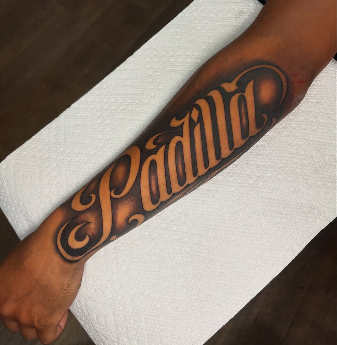 Tattoo by @osieltattoos โ lettering_script, chicano