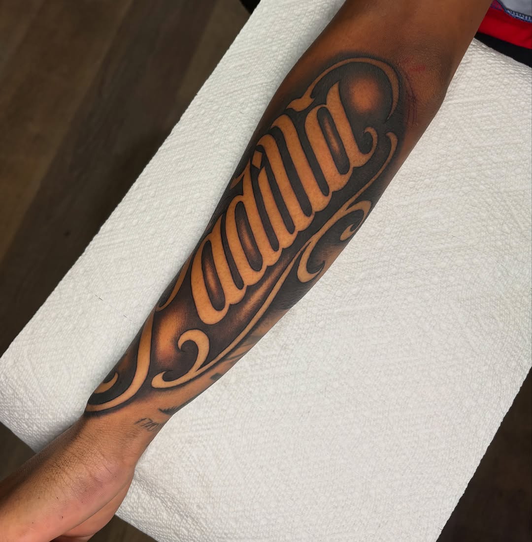 Tattoo by @osieltattoos โ lettering_script, chicano