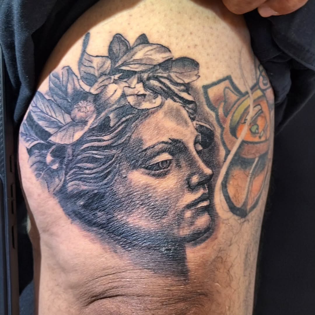 Tattoo by @t.rubio909 — realism, black_and_grey