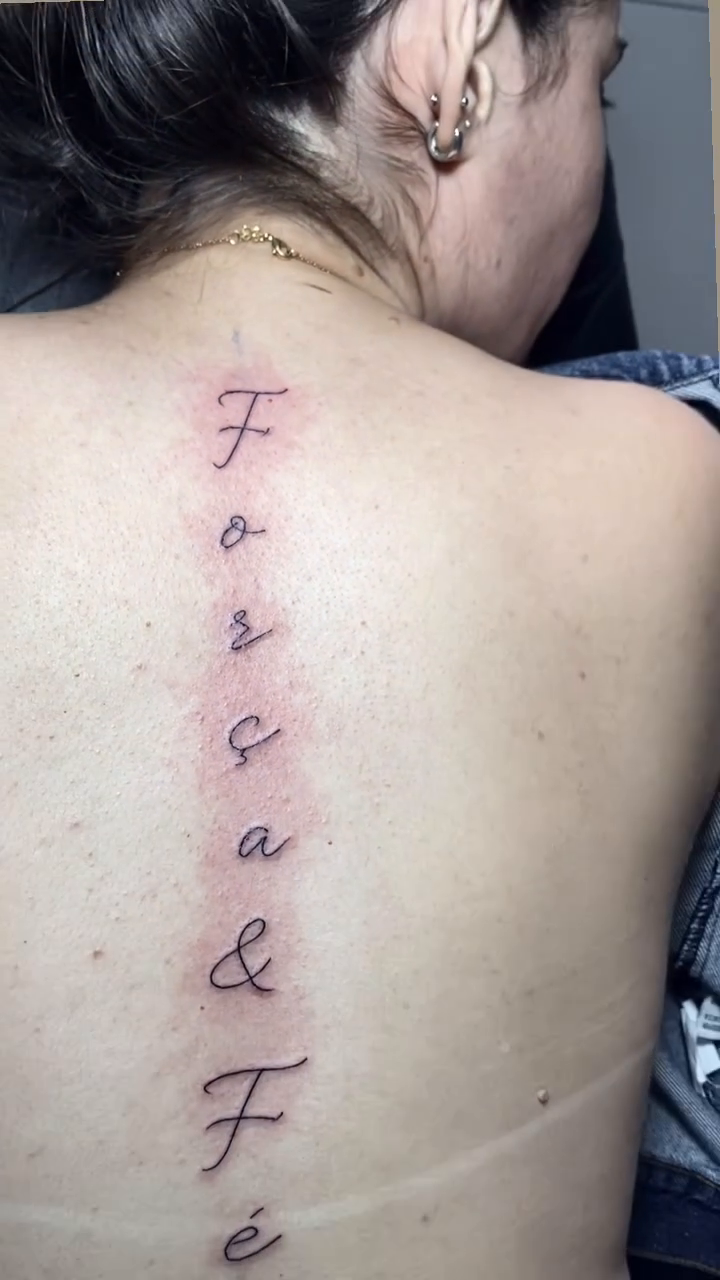Tattoo by @thaina.otero — lettering_script, fine_line