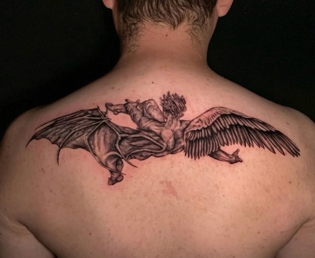 Tattoo by @elijahtats โ realism, black_and_grey