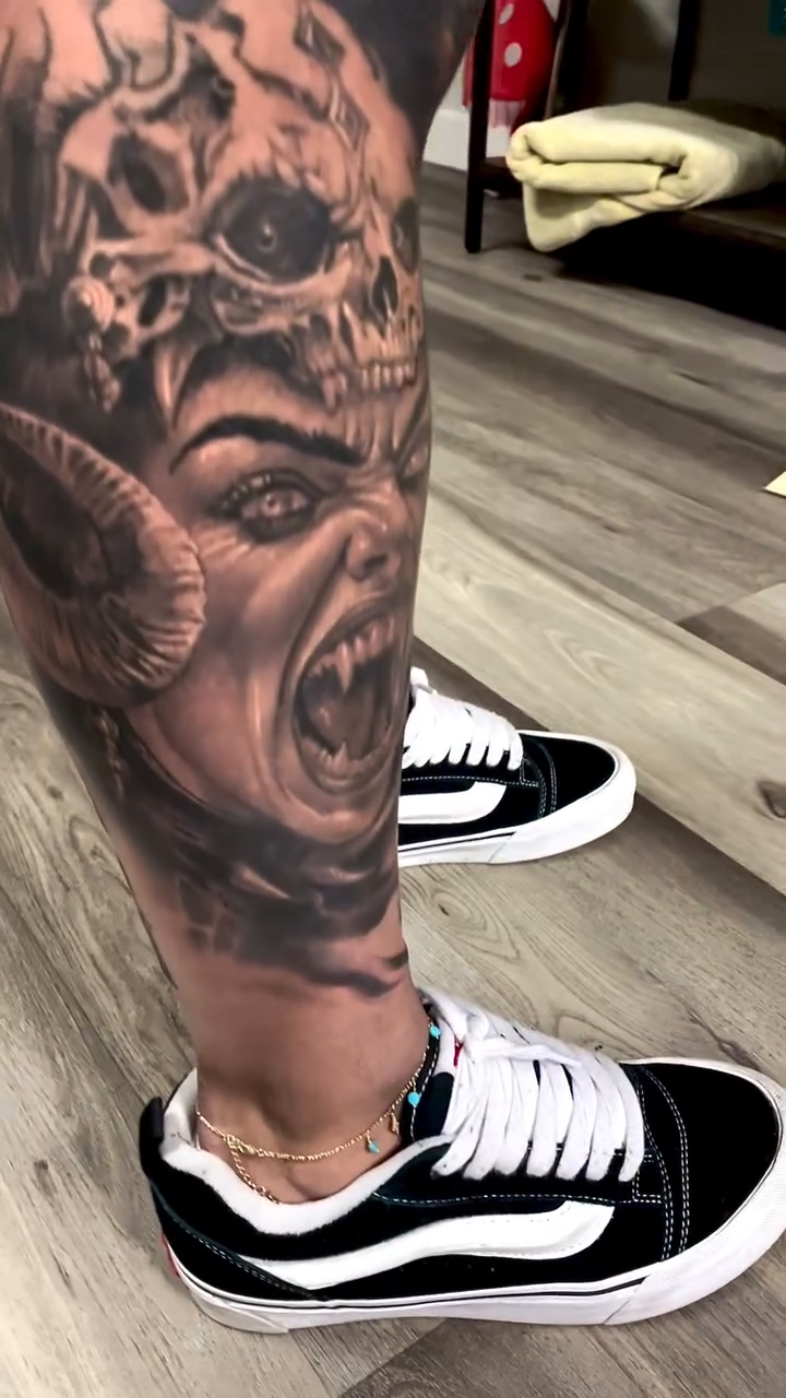 Tattoo by @davidgarnerart — black_and_grey, realism
