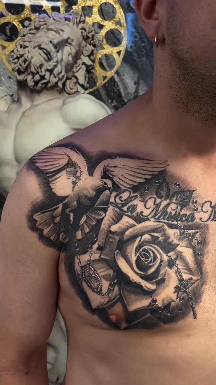 Tattoo by @marky_chavez โ realism, black_and_grey
