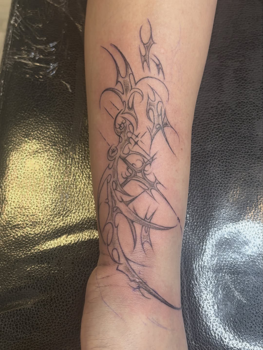 Tattoo by @valentine_tats — illustrative, geometric