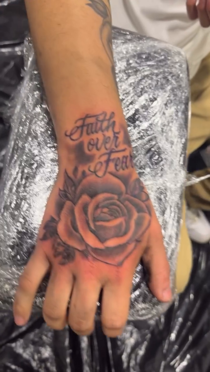 Tattoo by @ronnie.tatz β black_and_grey, lettering_script