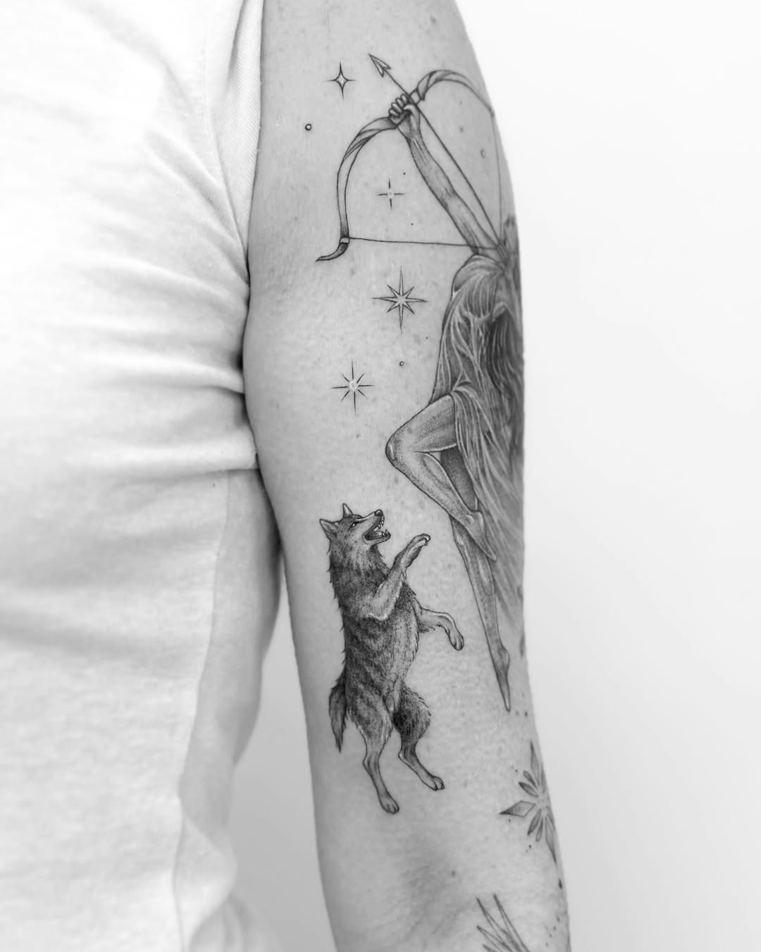 Tattoo by @nganvu.tattoo — realism, black_and_grey