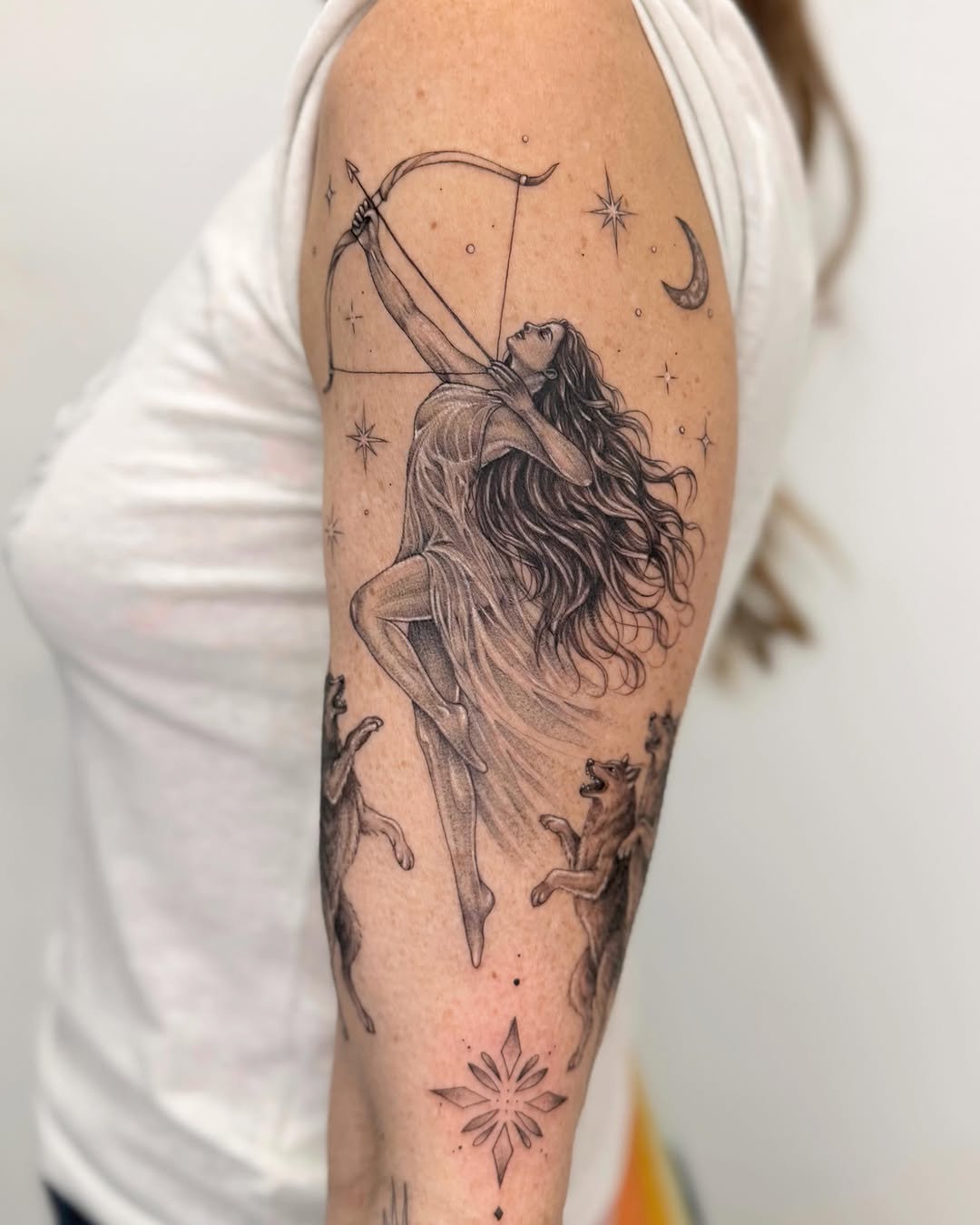 Tattoo by @nganvu.tattoo — realism, black_and_grey