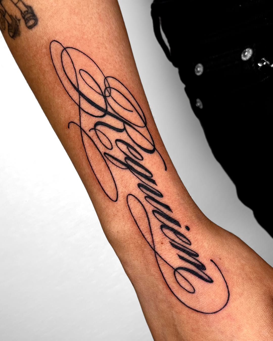 Tattoo by @ryu.inkz โ lettering_script, fine_line