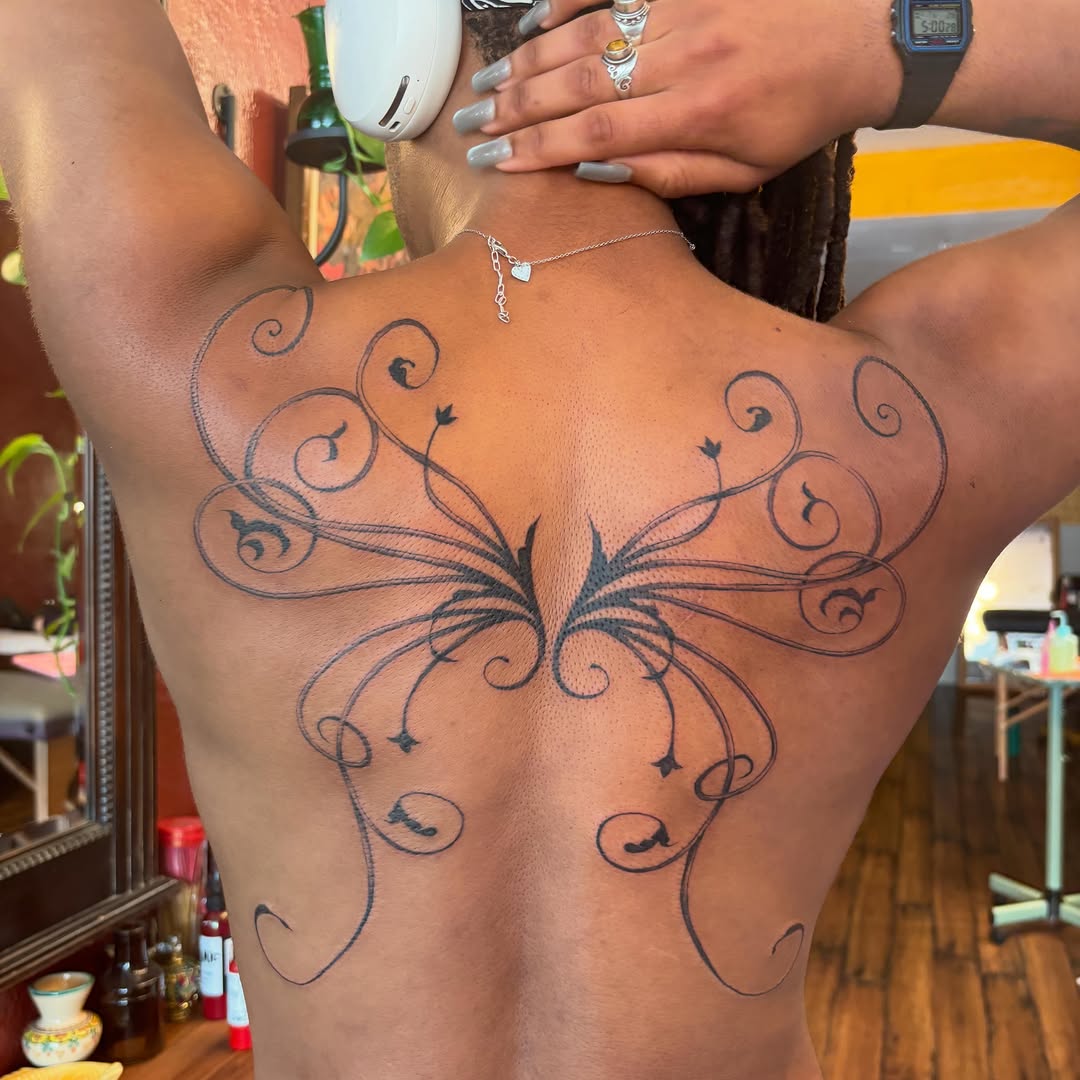 Tattoo by @xpg.ink — ornamental, black_and_grey
