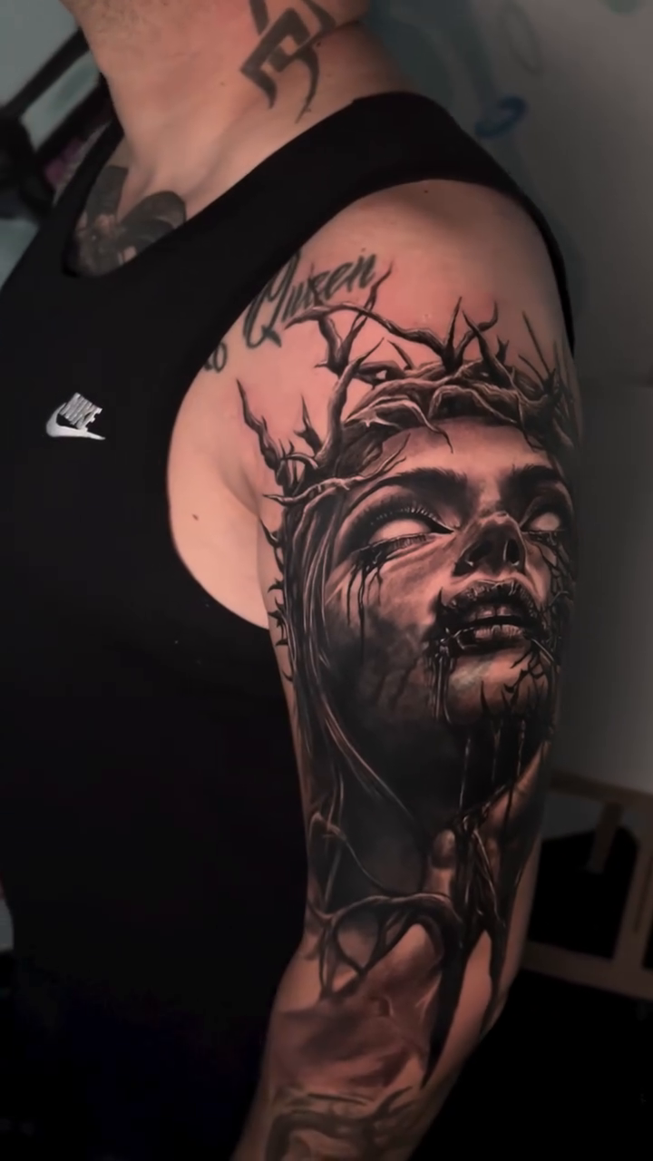 Tattoo by @ivan.tattoo.ic — dark_realism, black_and_grey