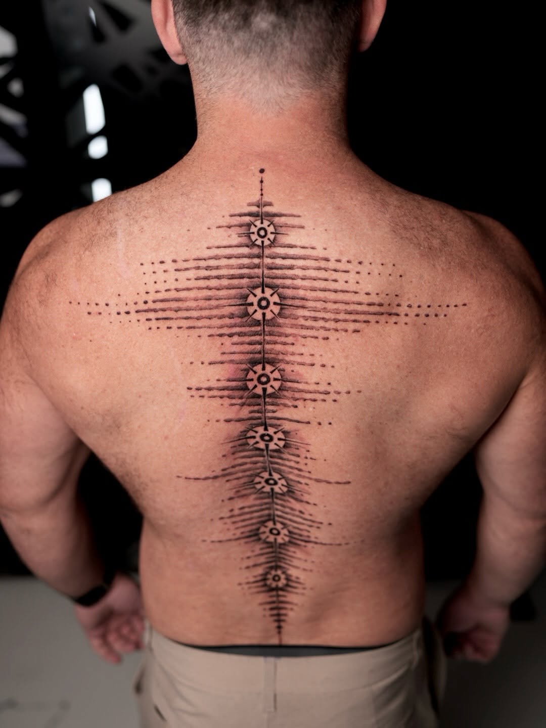 Tattoo by @d.vancasso.ink — geometric, dotwork