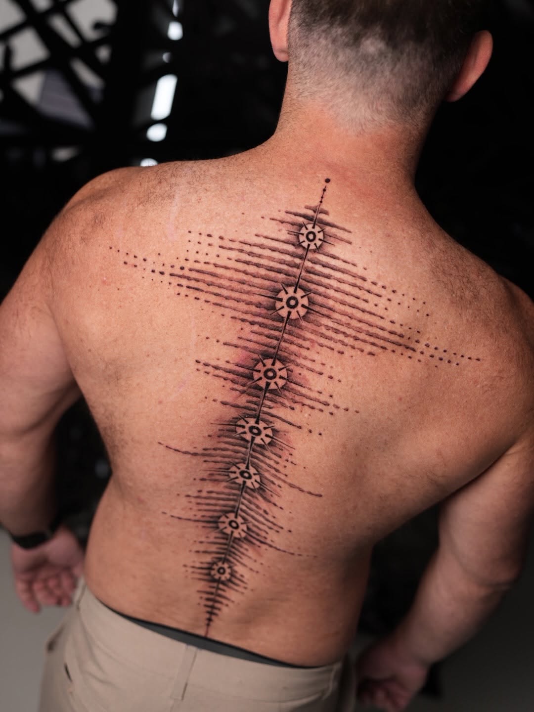 Tattoo by @d.vancasso.ink — geometric, dotwork