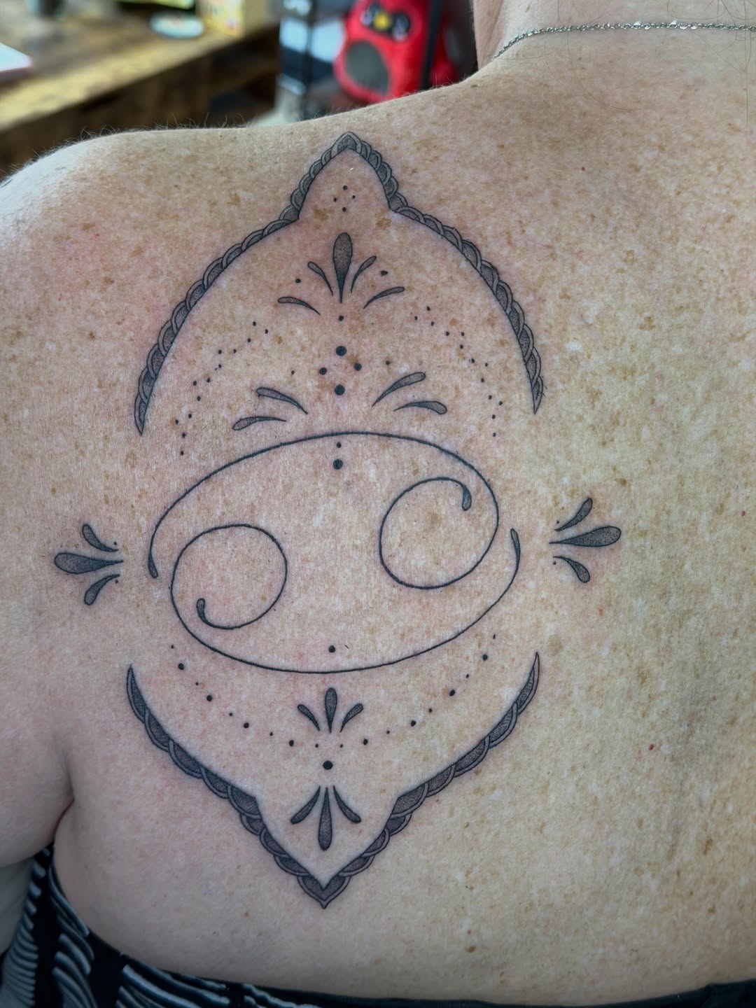 Tattoo by @thewolfmantattoos — geometric, dotwork