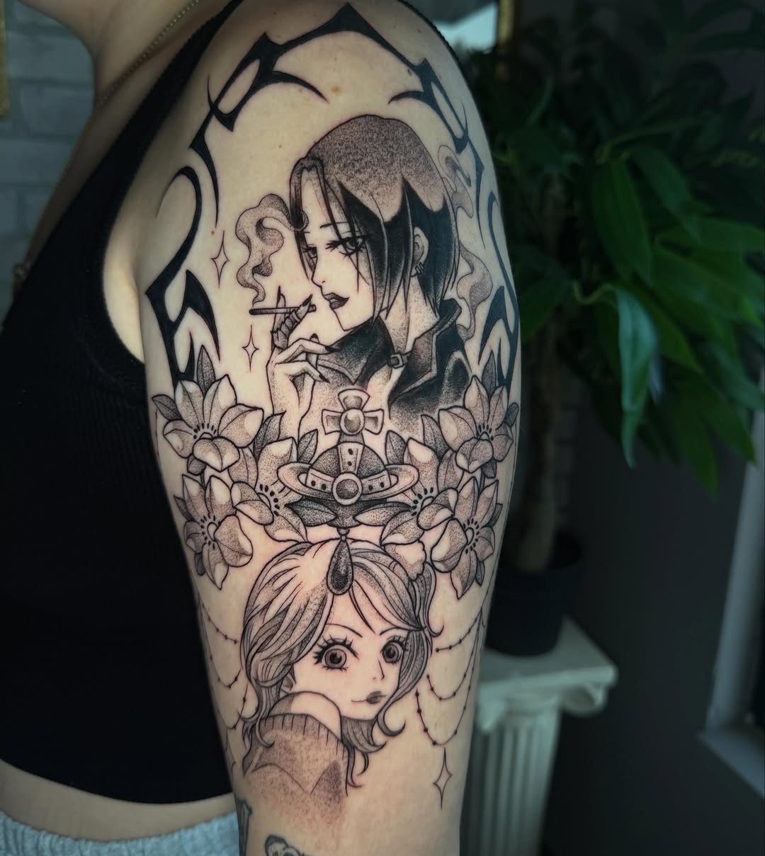 Tattoo by @sinful.tatts — anime, black_and_grey