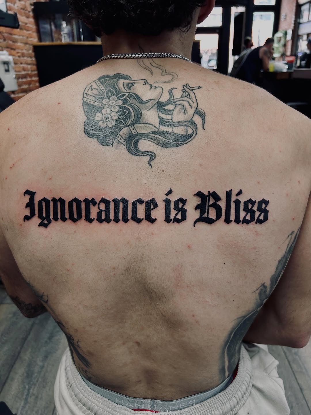 Tattoo by @boylazarustattoo — lettering_script, illustrative