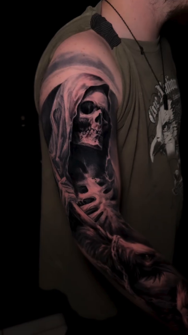 Tattoo by @kmoore_tattoos — dark_realism, black_and_grey