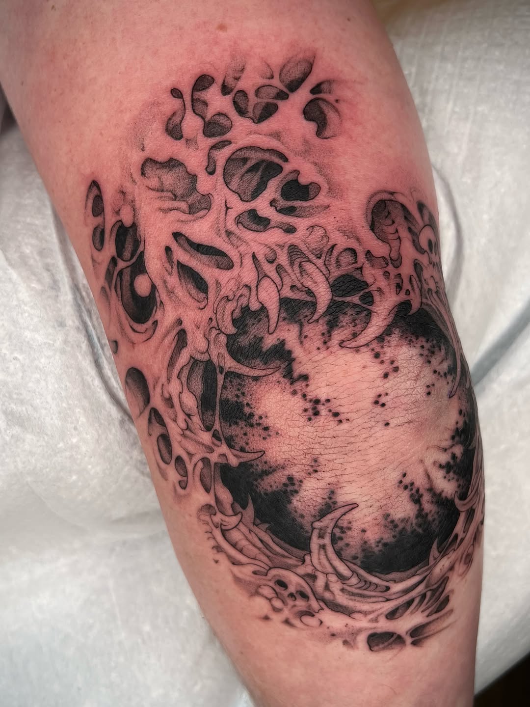 Tattoo by @revoltingworship — dark_realism, black_and_grey
