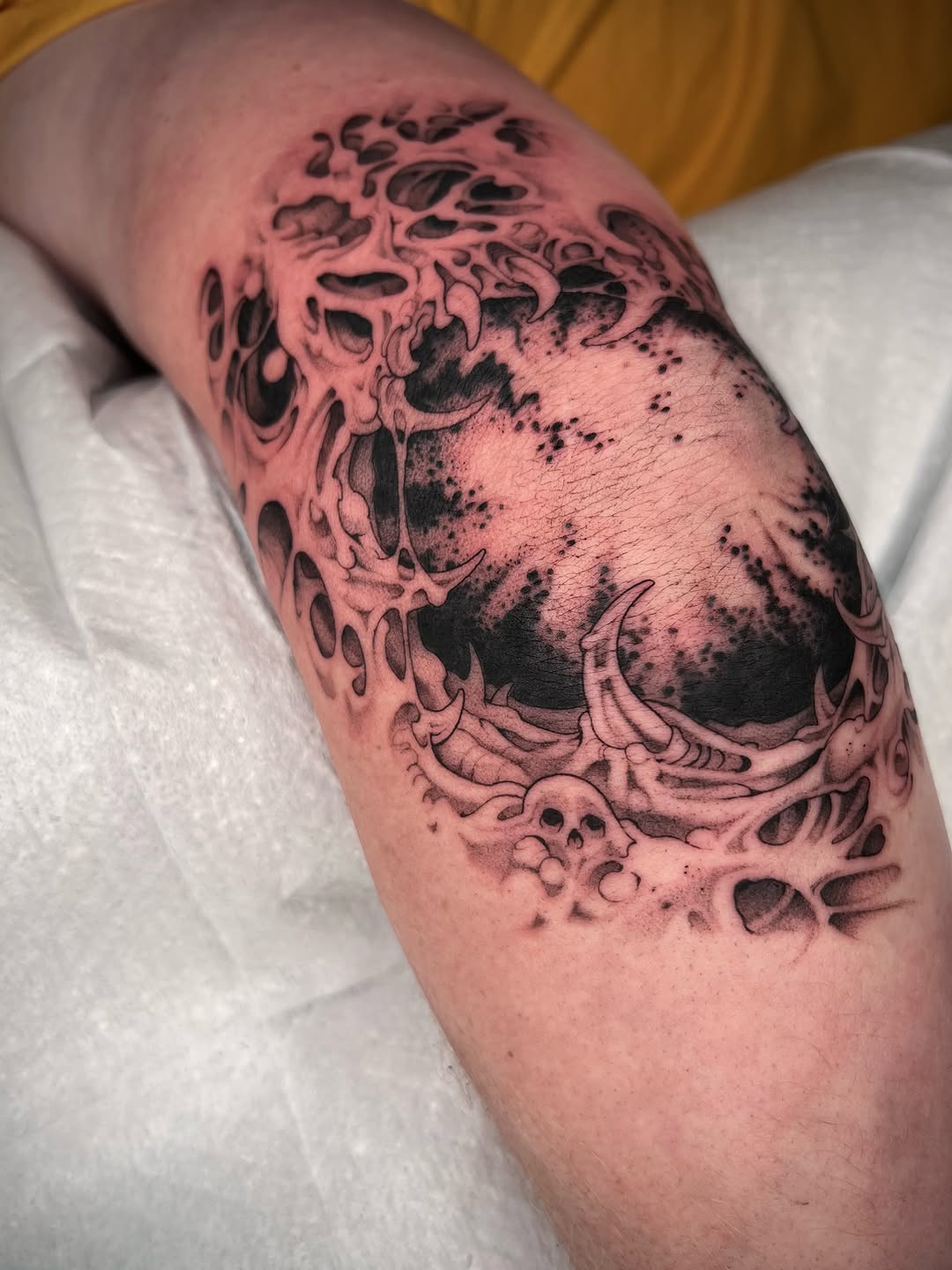Tattoo by @revoltingworship — dark_realism, black_and_grey