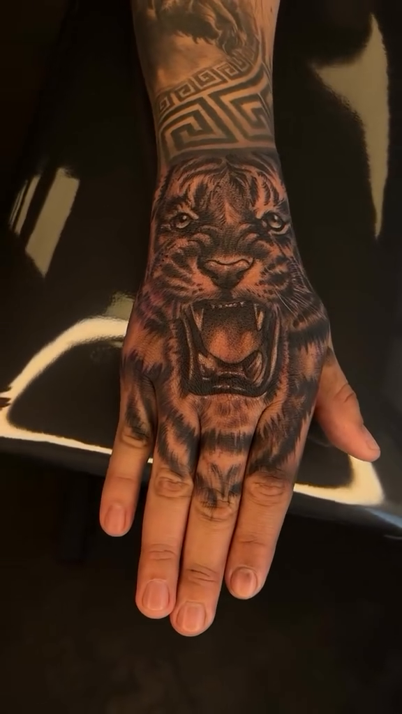 Tattoo by @marcos_tattoos — realism, black_and_grey
