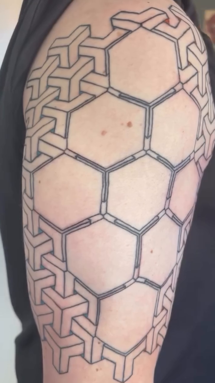 Tattoo by @vo.ink.metric โ geometric, illustrative