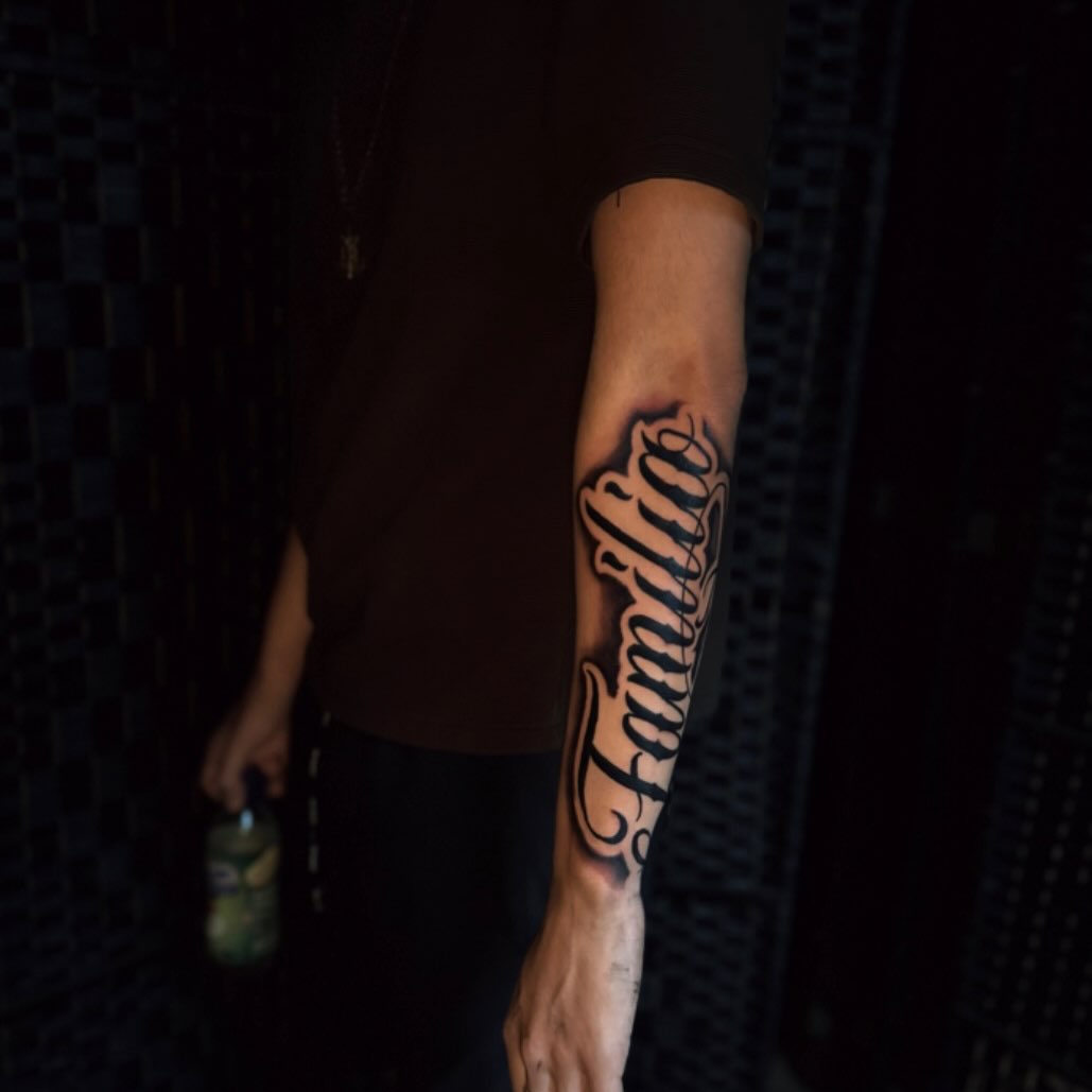 Tattoo by @bretts.ink โ lettering_script, chicano