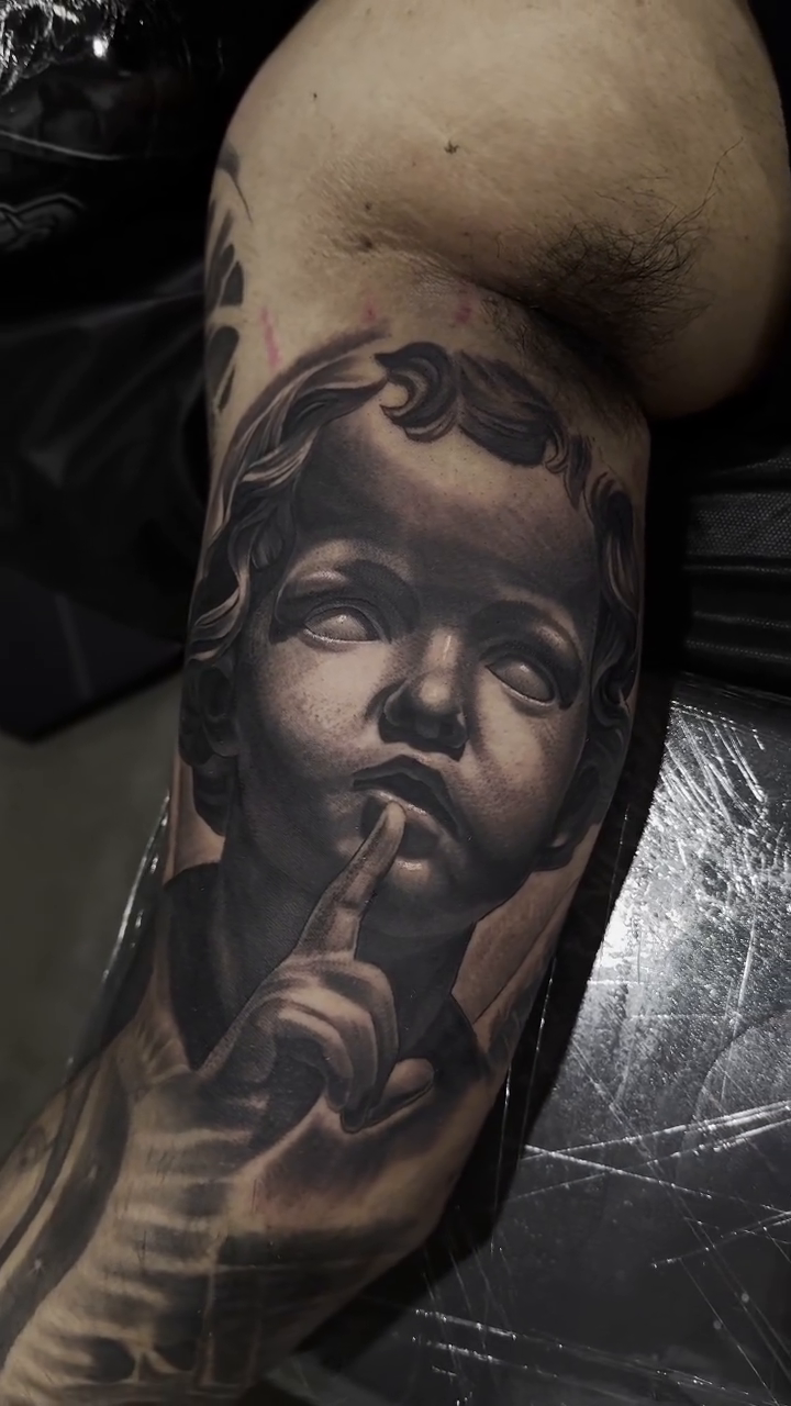 Tattoo by @tattoo_isaac562 โ realism, black_and_grey