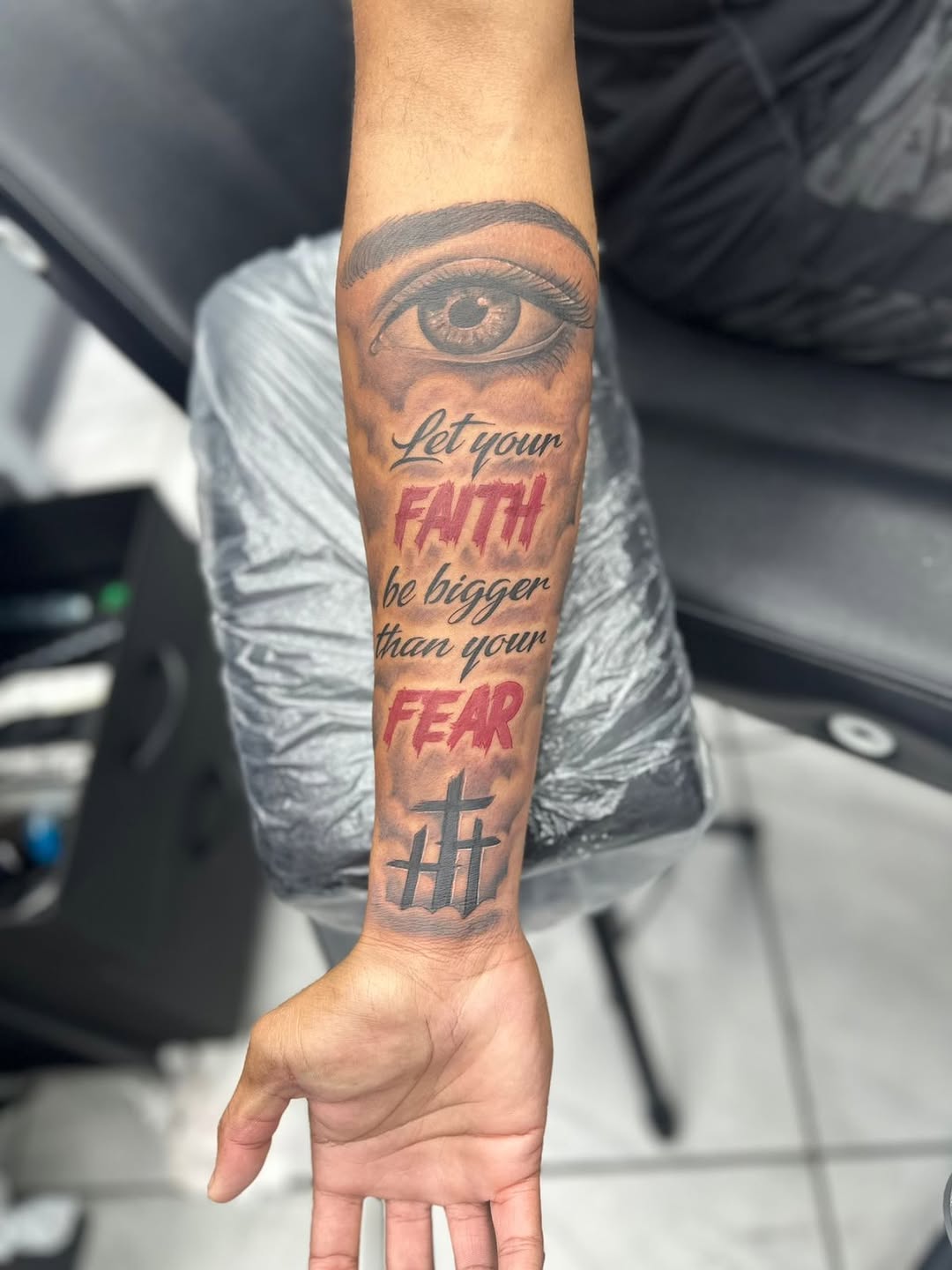 Tattoo by @onasistattoo — realism, lettering_script