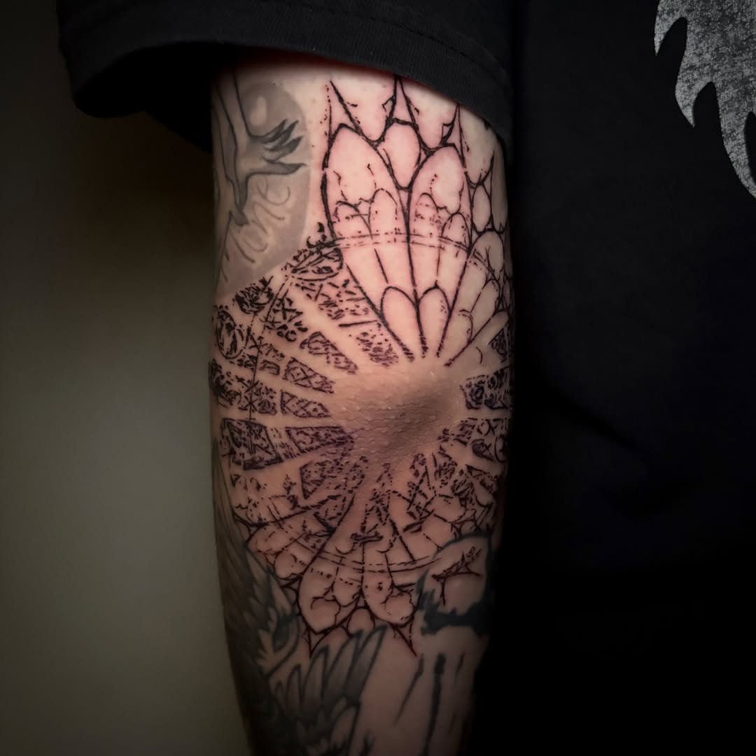 Tattoo by @unknownliquids — geometric, blackwork