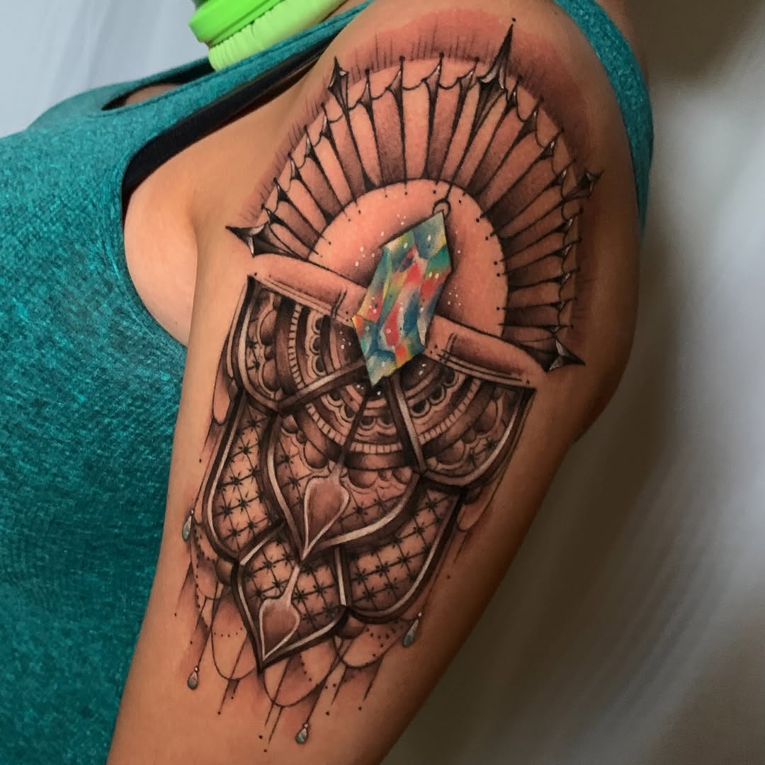 Tattoo by @bodyartbycuda — geometric, dotwork