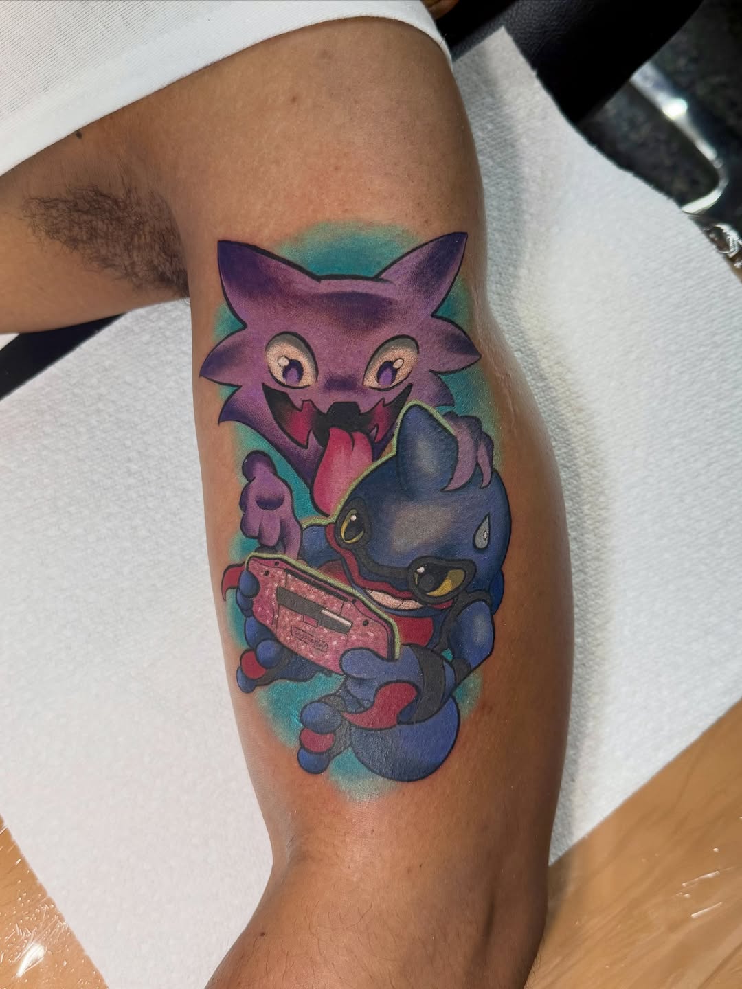 Tattoo by @tader.the.creator — illustrative, anime