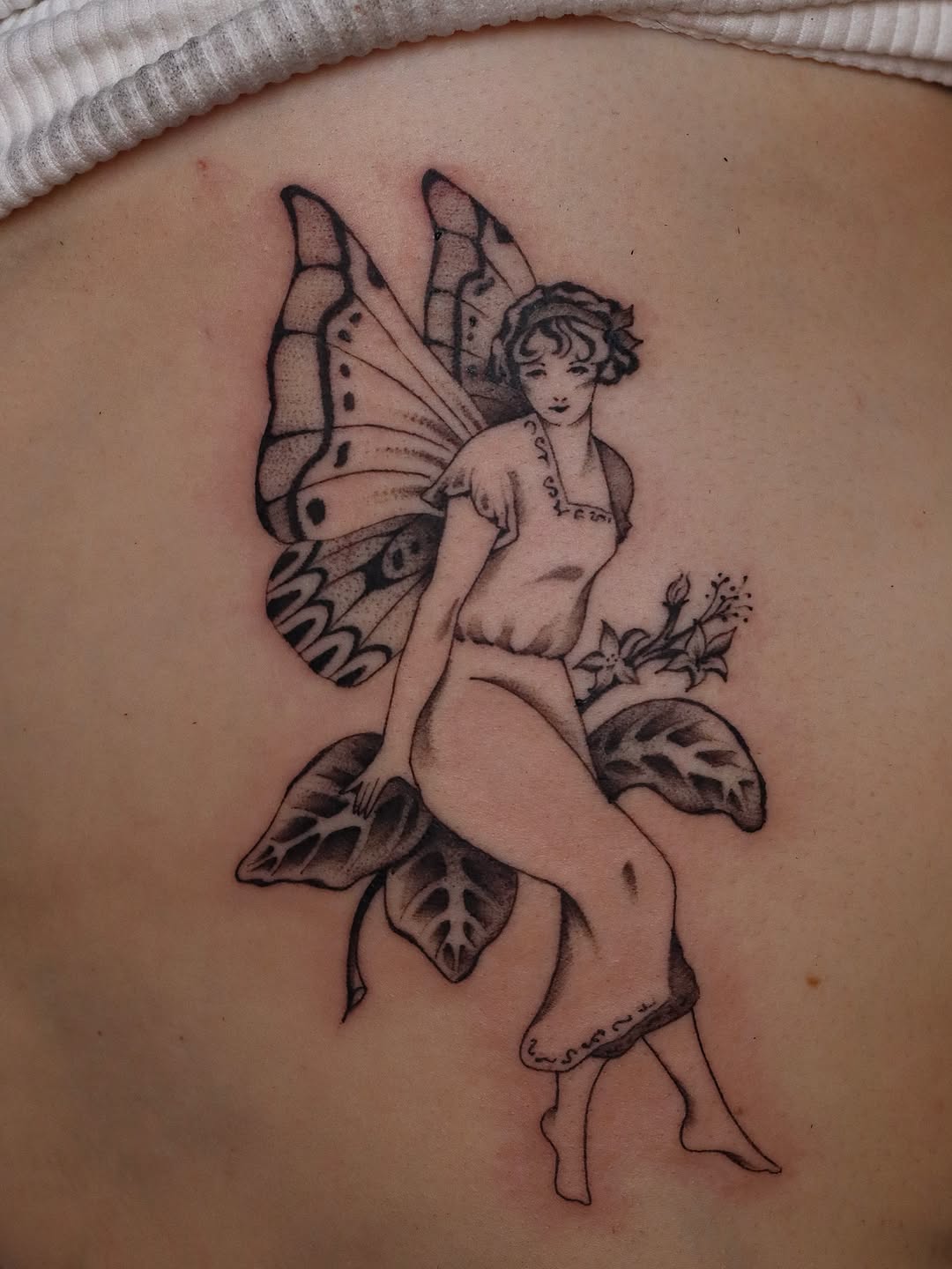 Tattoo by @nik.checots — black_and_grey, fine_line