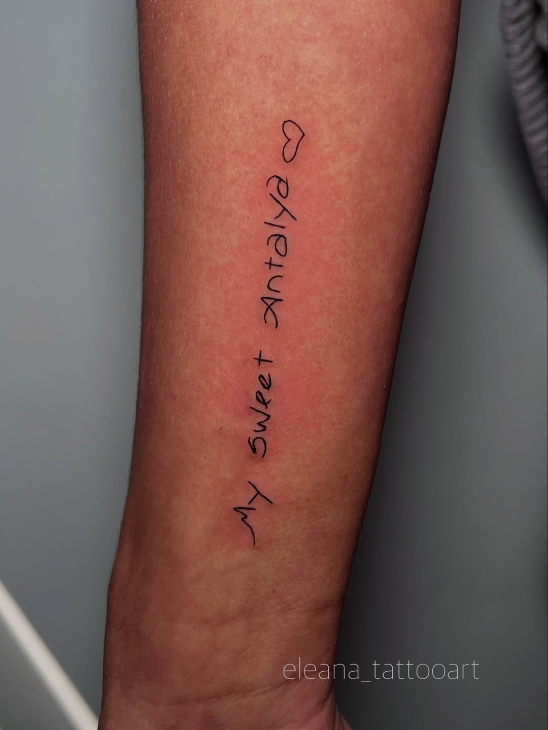 Tattoo by @eleana_tattooart — lettering_script, fine_line