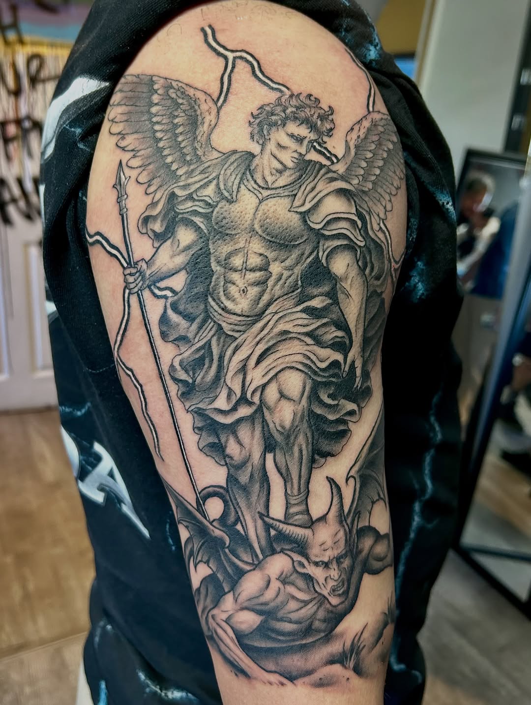 Tattoo by @darklord_665 — realism, black_and_grey