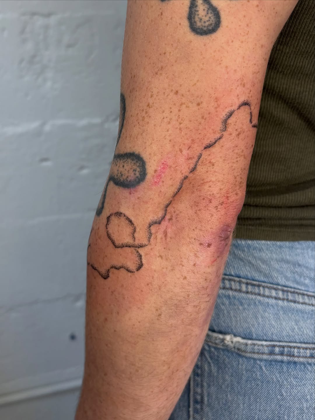 Tattoo by @sabpokes — illustrative, blackwork