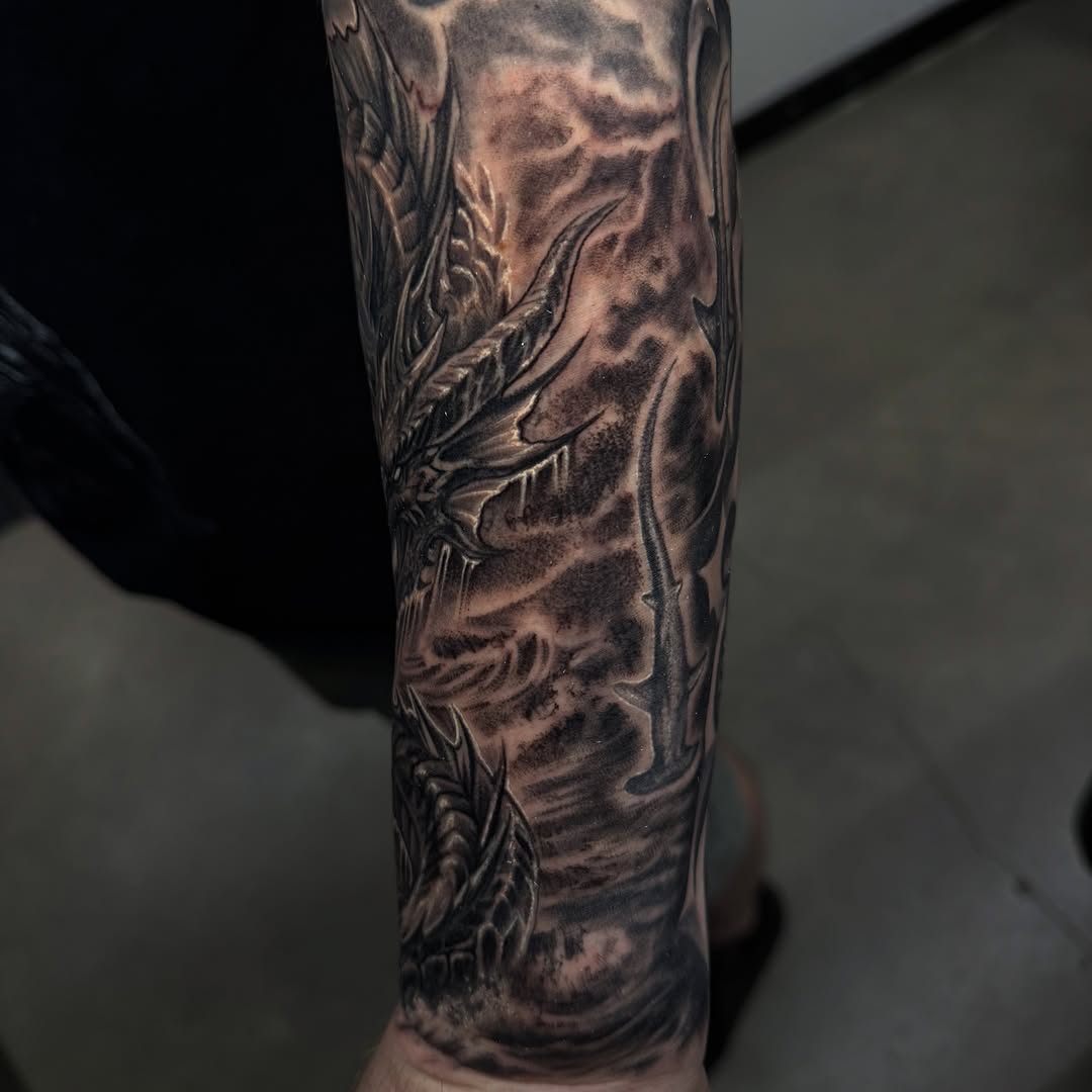 Tattoo by @aleman.adan — realism, black_and_grey