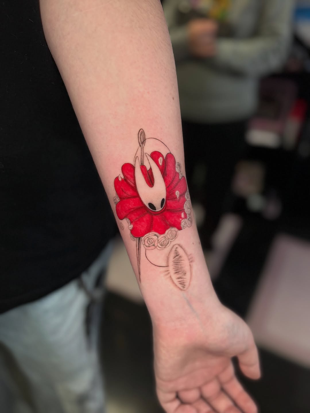 Tattoo by @liii.ink — illustrative, anime