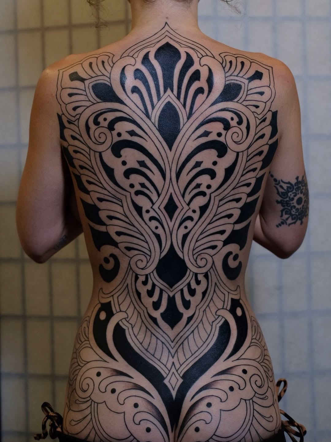 Tattoo by @owlyntattoo — blackwork, ornamental