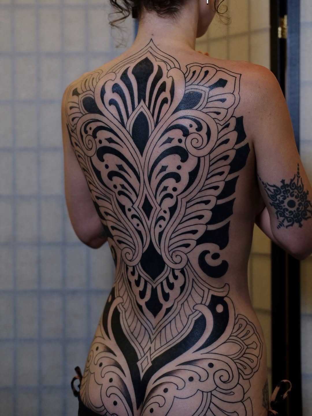 Tattoo by @owlyntattoo — ornamental, blackwork