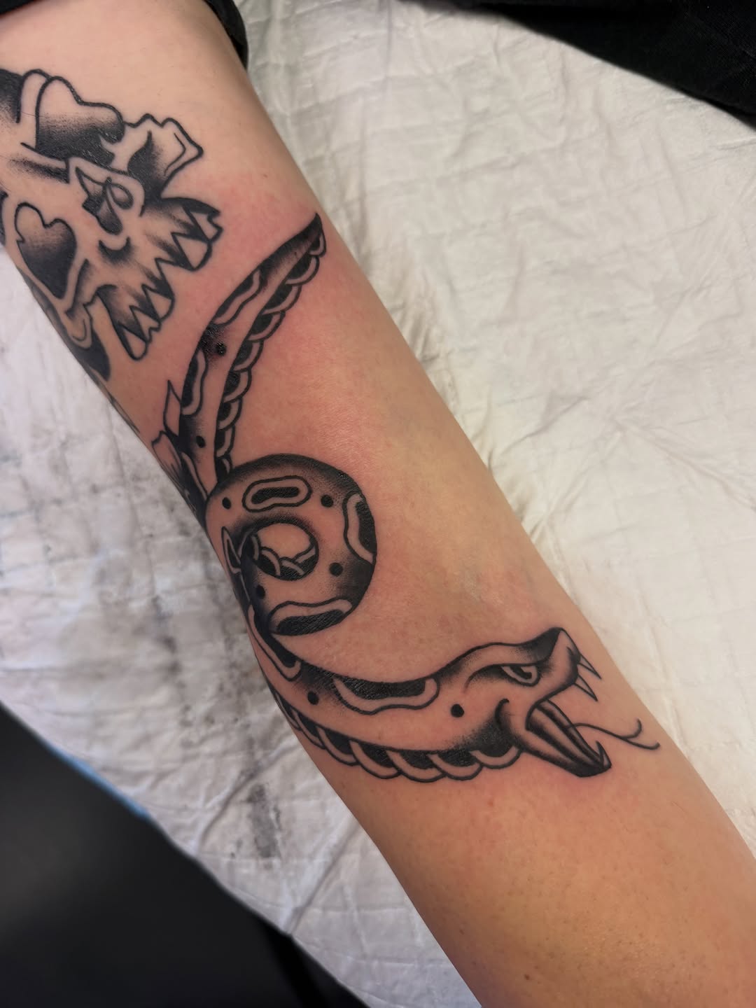 Tattoo by @tummtats — american_traditional, blackwork