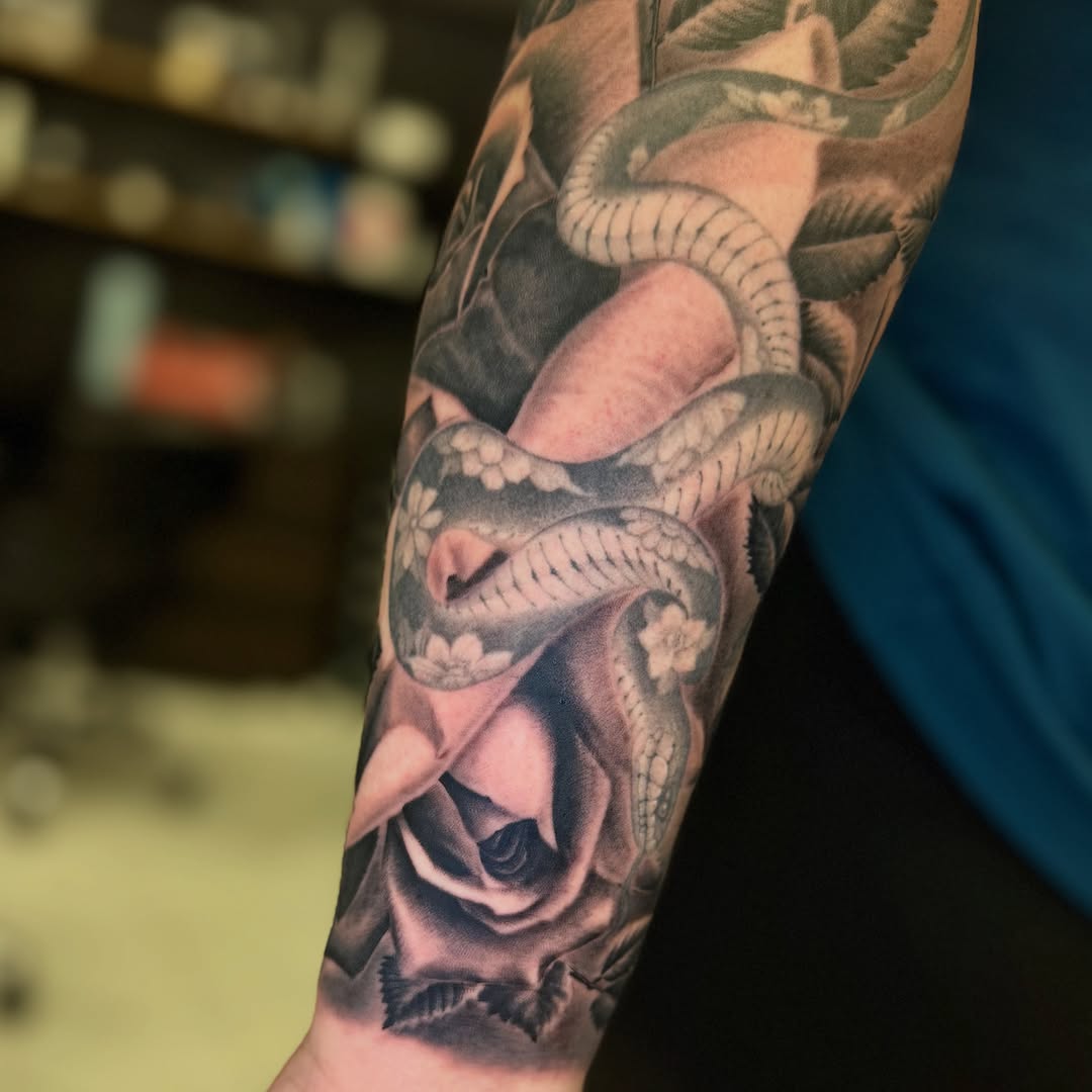Tattoo by @tuannguyen_tattoo — realism, black_and_grey