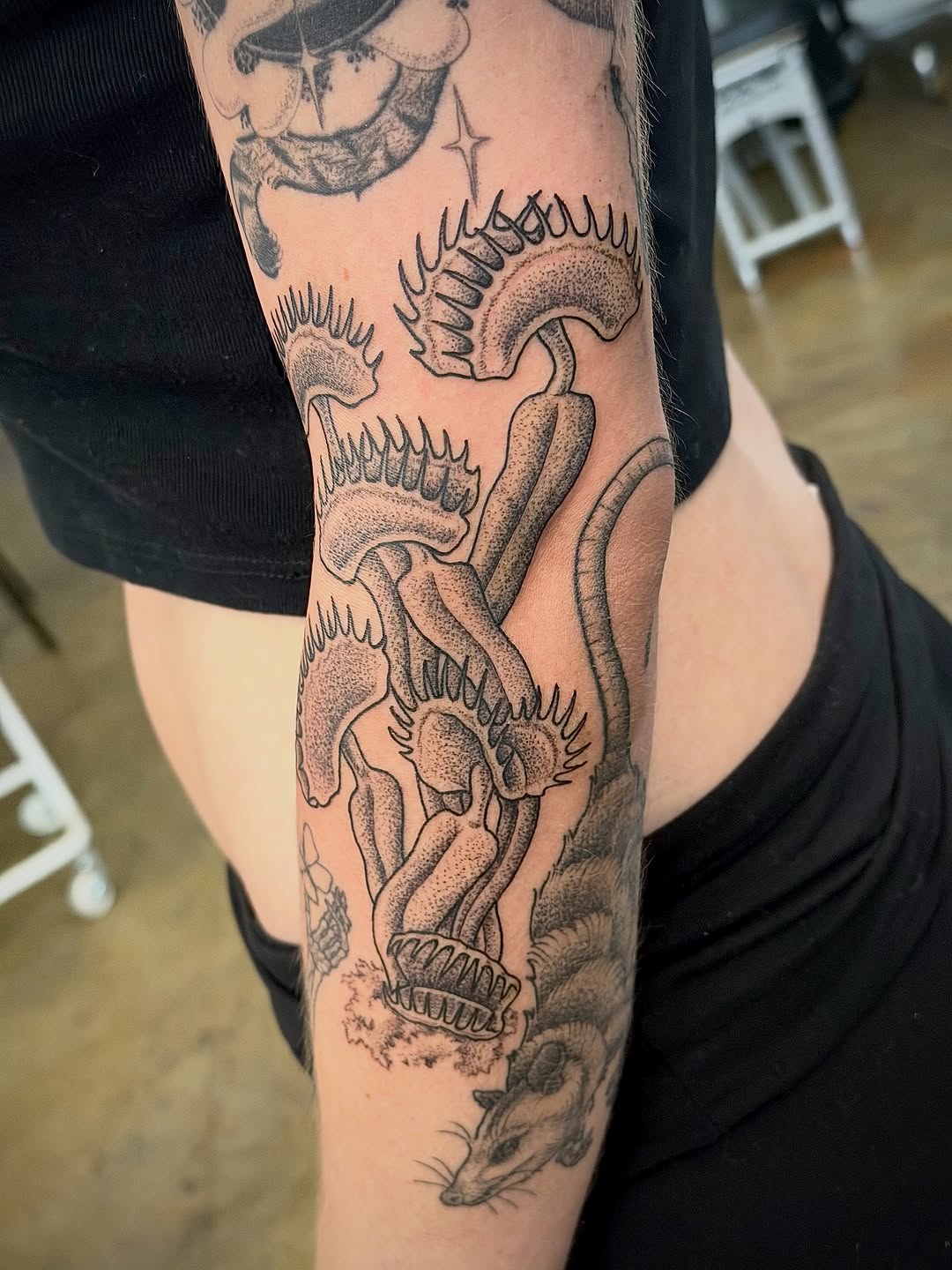 Tattoo by @scruffy_tattooer — black_and_grey, dotwork