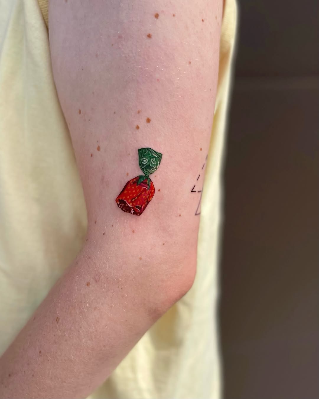 Tattoo by @av1.ink — illustrative, realism