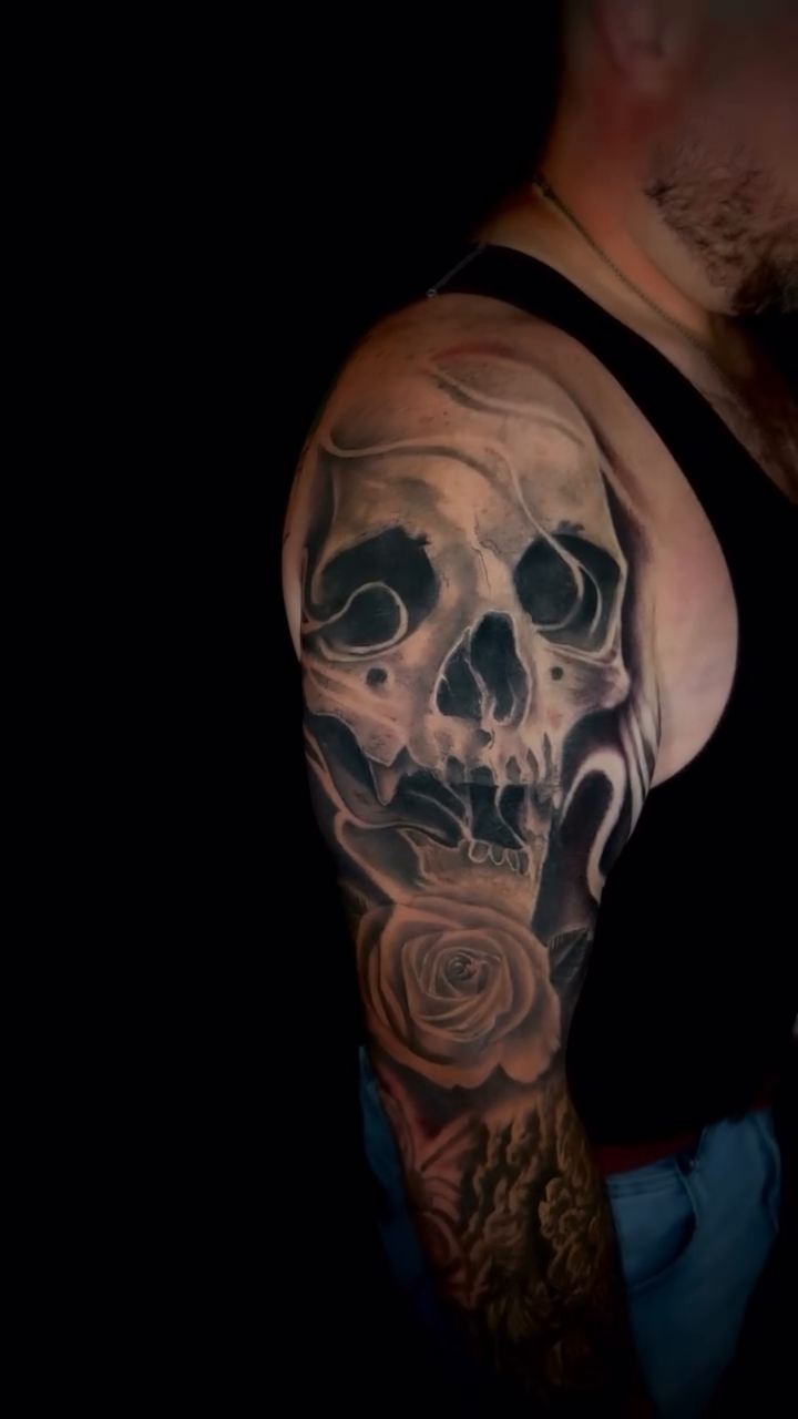Tattoo by @romanstarkey_ — black_and_grey, realism