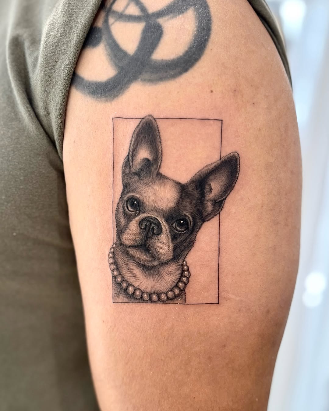 Tattoo by @tiny_tim.tatts โ realism, black_and_grey