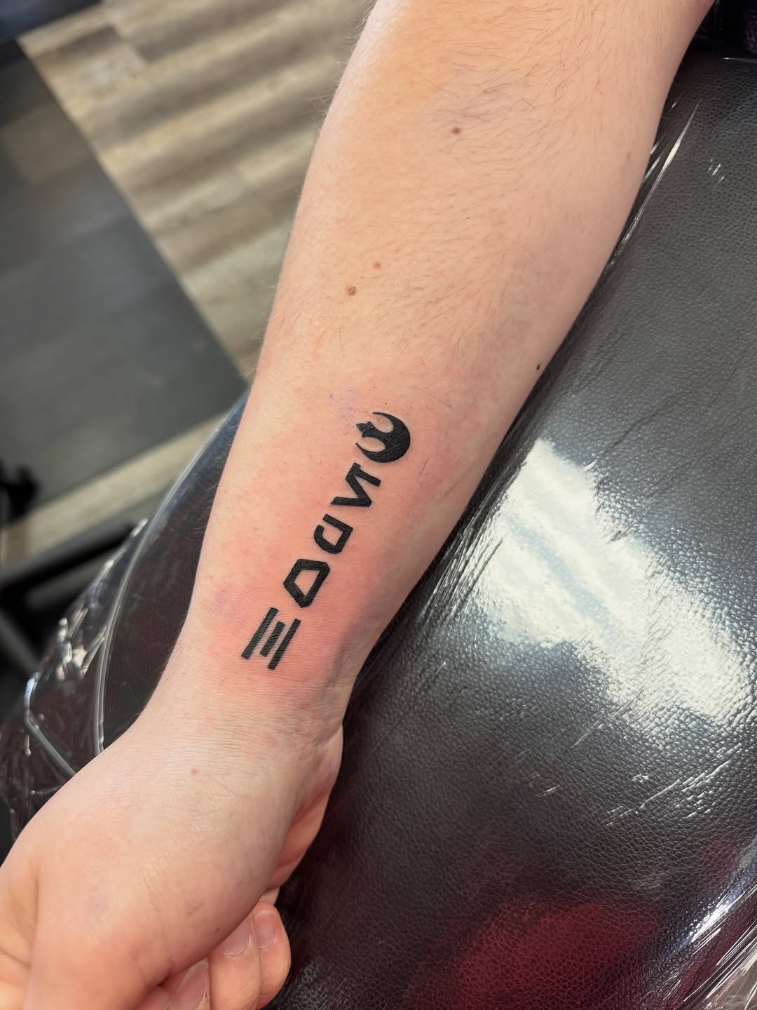 Tattoo by @rylandtattoos — lettering_script, blackwork