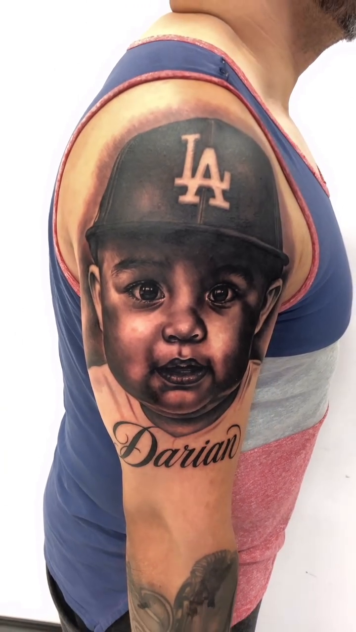 Tattoo by @dboy_87 โ realism, black_and_grey