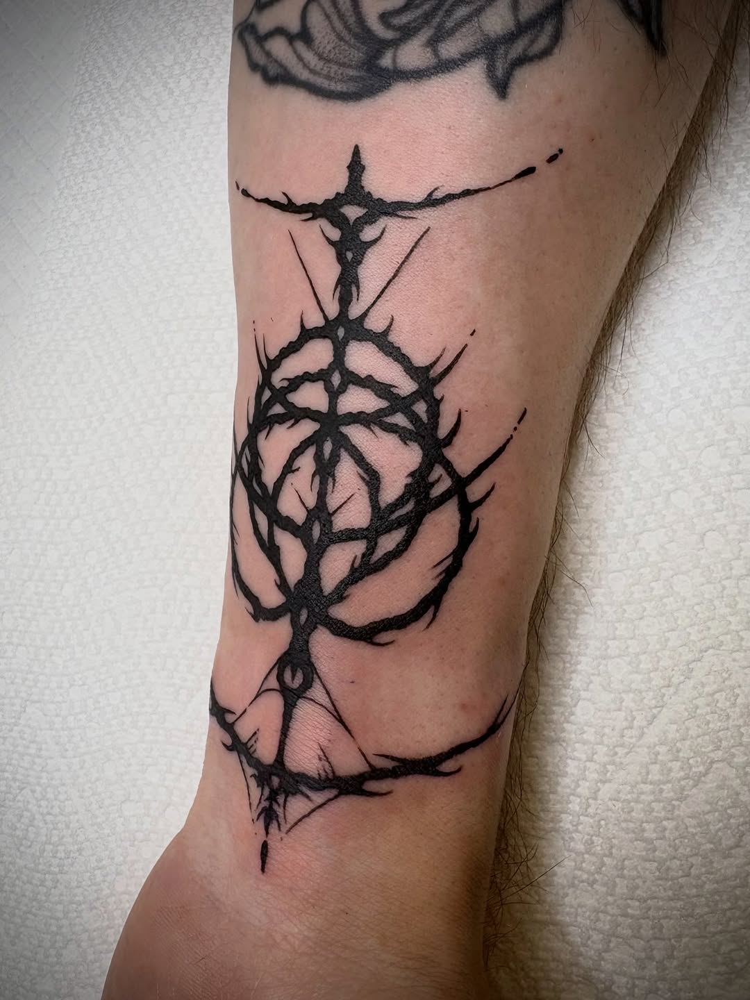 Tattoo by @harmo.ink — blackwork, illustrative